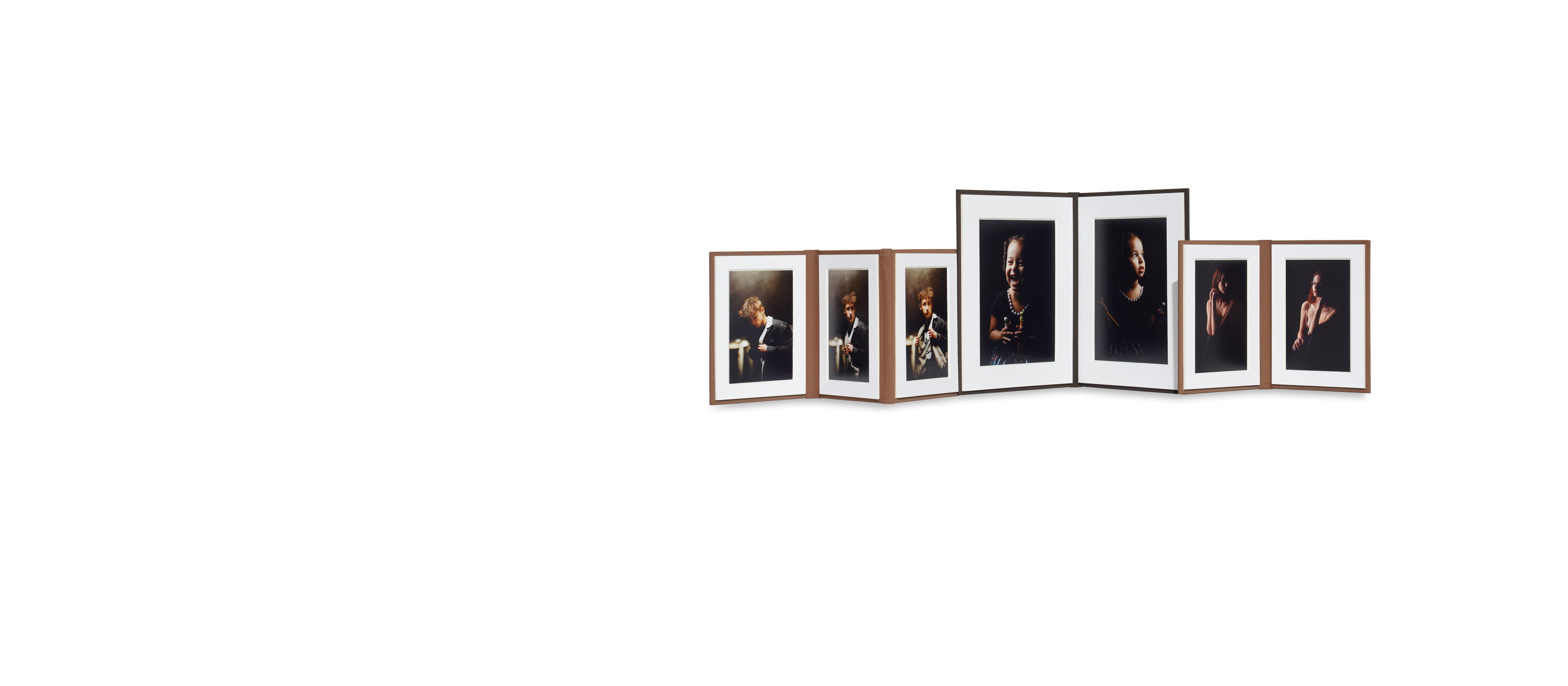 three matted image folios in different sizes